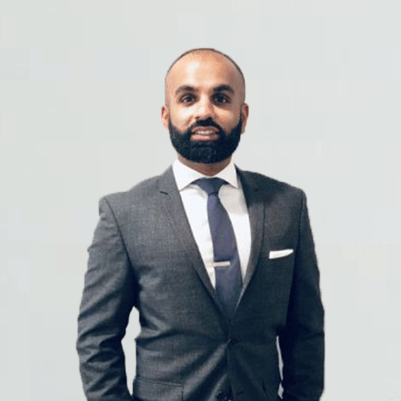 A picture of a smiling dentist.